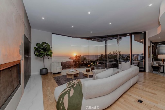 1195 La Mirada St, Laguna Beach, CA 92651 - living area with floor to ceiling windows, recessed lighting, and a fireplace