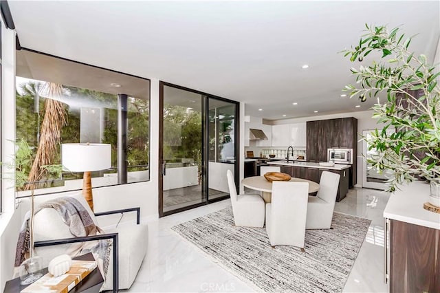 1195 La Mirada St, Laguna Beach, CA 92651 - dining space with light marble finish floors, recessed lighting, and healthy amount of natural light