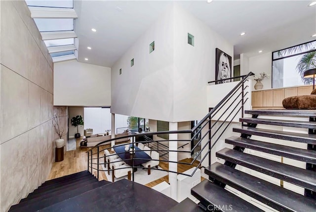 1195 La Mirada St, Laguna Beach, CA 92651 - staircase featuring wood finished floors and recessed lighting