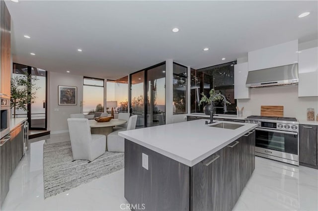 1195 La Mirada St, Laguna Beach, CA 92651 - kitchen with modern cabinets, stainless steel range with electric cooktop, wall chimney range hood, white cabinetry, and light countertops