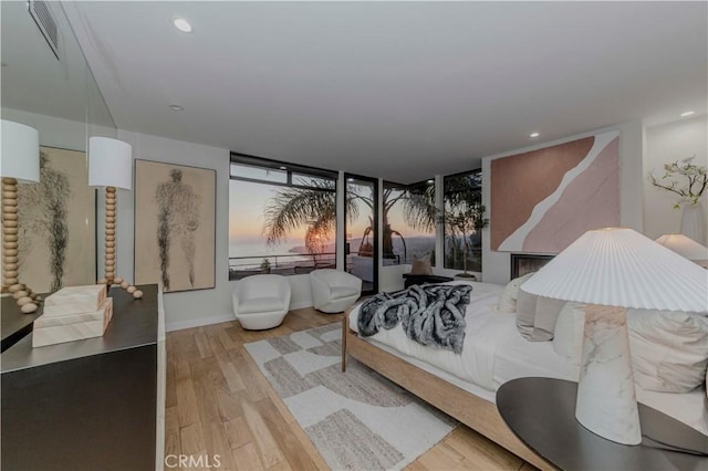 1195 La Mirada St, Laguna Beach, CA 92651 - bedroom with wood finished floors and recessed lighting