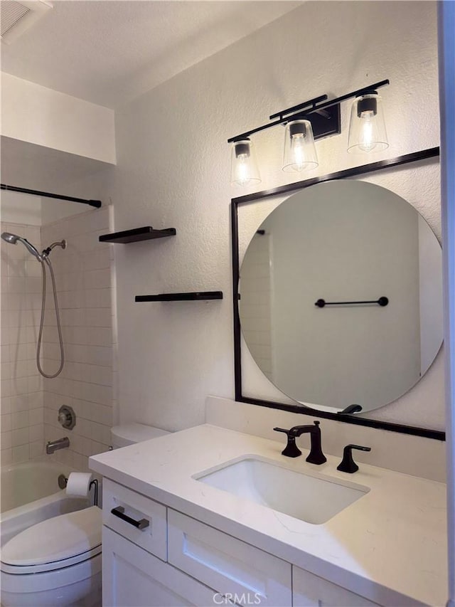 8711 Chessington Dr Unit D, Inglewood, CA 90305 - full bath with vanity,  shower combination, and a textured wall