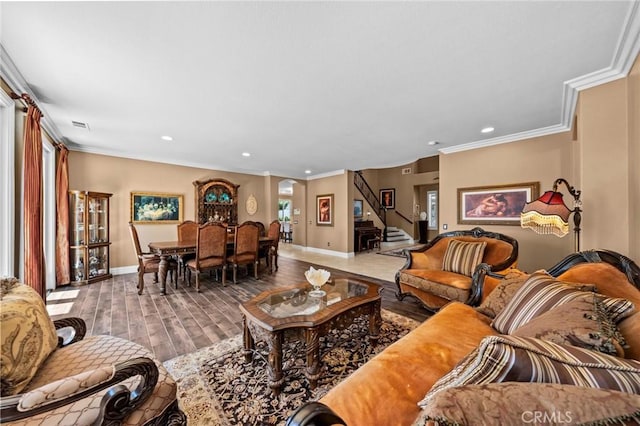 32409 Favara Dr, Temecula, CA 92592 - living area featuring crown molding, stairway, wood finished floors, and recessed lighting