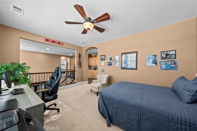 32409 Favara Dr, Temecula, CA 92592 - bedroom featuring light carpet, a desk, and arched walkways