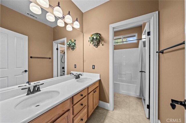 32409 Favara Dr, Temecula, CA 92592 - bathroom featuring double vanity and tile patterned flooring