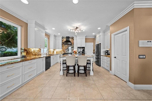 32409 Favara Dr, Temecula, CA 92592 - kitchen featuring stainless steel appliances, wall chimney range hood, backsplash, white cabinetry, and ornamental molding