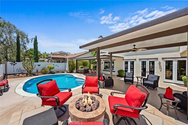 32409 Favara Dr, Temecula, CA 92592 - view of pool with french doors, a fenced backyard, a patio, and a ceiling fan