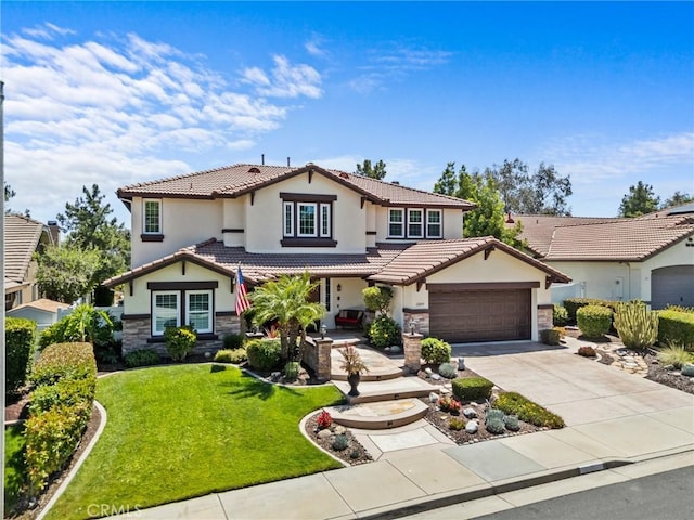 32409 Favara Dr, Temecula, CA 92592 - view of front of property with stucco siding, stone siding, a tile roof, a front lawn, and concrete driveway