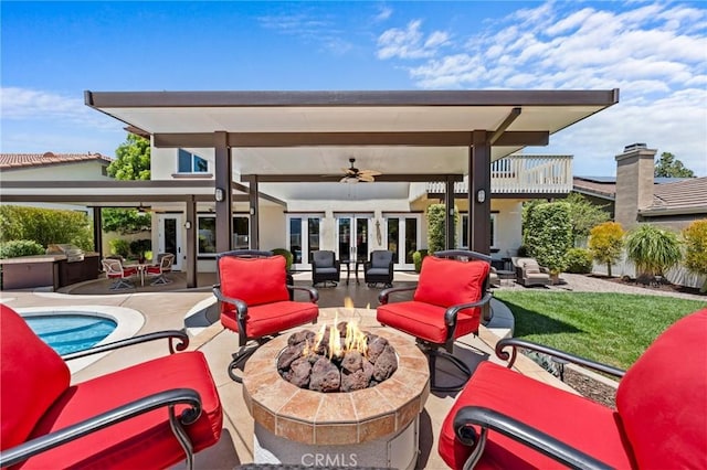 32409 Favara Dr, Temecula, CA 92592 - view of patio / terrace with ceiling fan, an outdoor pool, french doors, area for grilling, and an outdoor living space with a fire pit