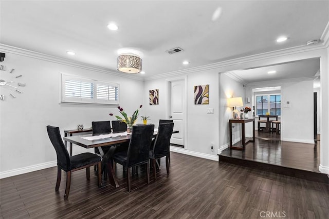 10622 Ashworth St, Bellflower, CA 90706 - dining room with dark wood-style flooring, ornamental molding, and recessed lighting