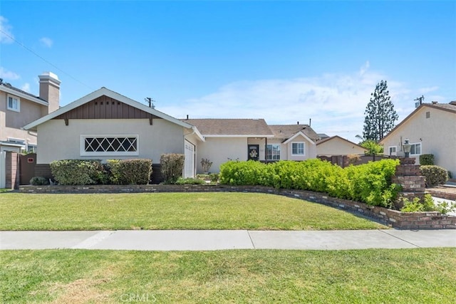10622 Ashworth St, Bellflower, CA 90706 - view of front of home featuring a front yard and stucco siding