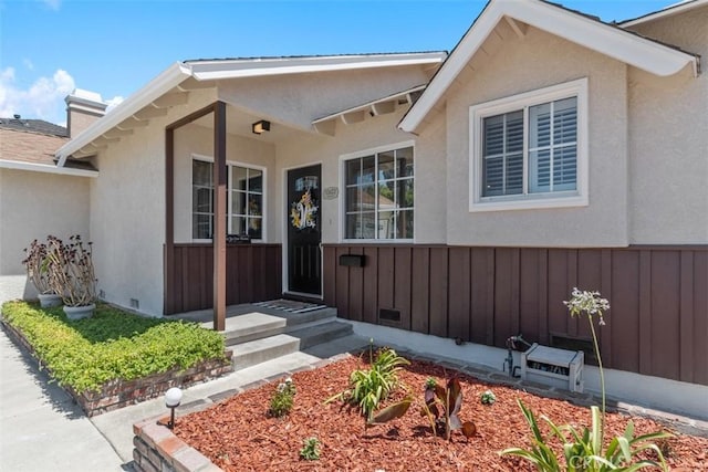 10622 Ashworth St, Bellflower, CA 90706 - property entrance featuring stucco siding and a chimney