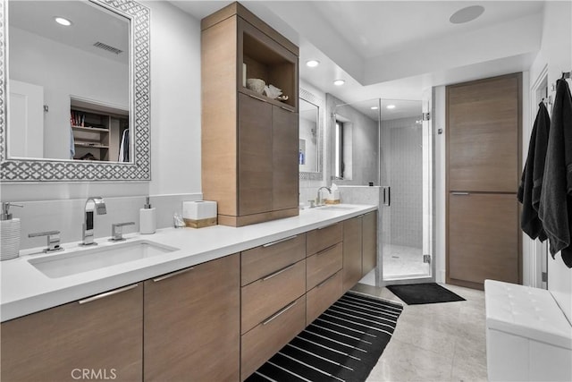 112 30th St, Newport Beach, CA 92663 - full bathroom featuring double vanity, a stall shower, recessed lighting, tile patterned flooring, and a spacious closet