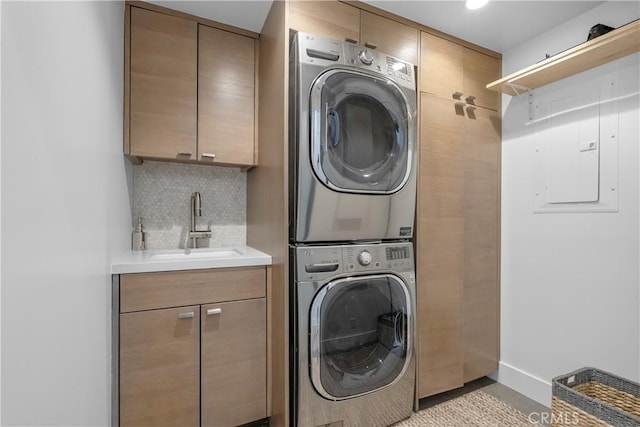 112 30th St, Newport Beach, CA 92663 - laundry area with stacked washing machine and dryer and cabinet space