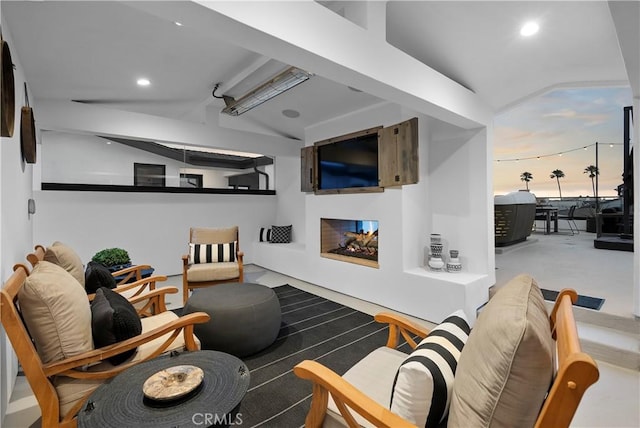 112 30th St, Newport Beach, CA 92663 - living area with lofted ceiling, a multi sided fireplace, and recessed lighting