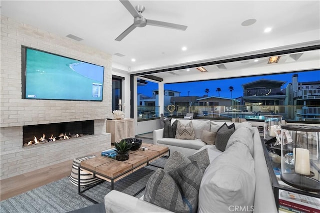 112 30th St, Newport Beach, CA 92663 - living area with wood finished floors, ceiling fan, a fireplace, and recessed lighting