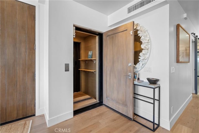 112 30th St, Newport Beach, CA 92663 - foyer entrance featuring baseboards and light wood-style flooring