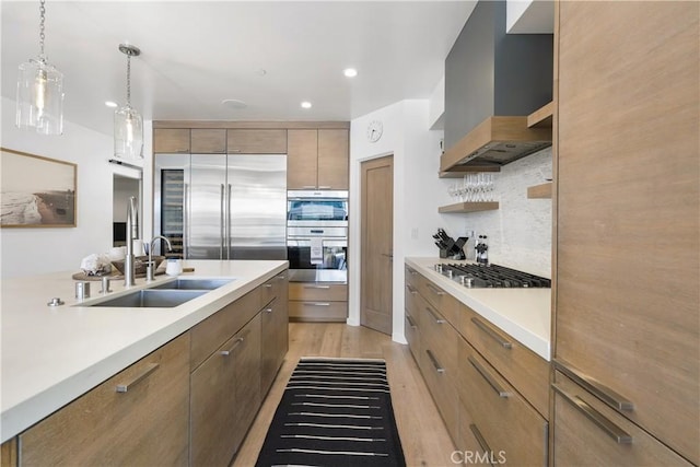 112 30th St, Newport Beach, CA 92663 - kitchen with wall chimney range hood, open shelves, stainless steel appliances, light countertops, and decorative backsplash