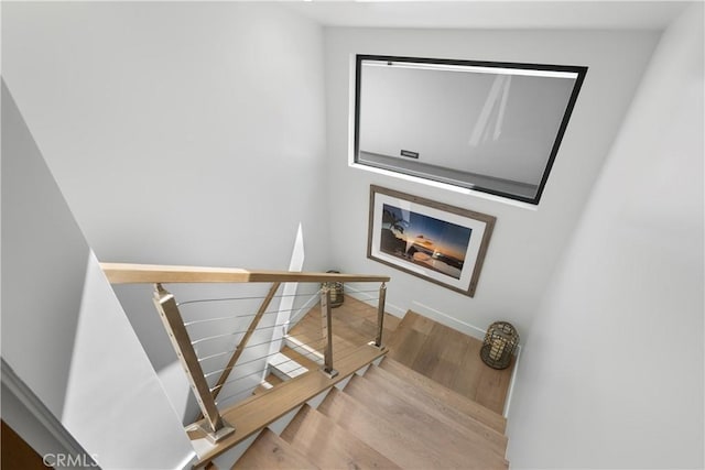 112 30th St, Newport Beach, CA 92663 - staircase featuring wood finished floors