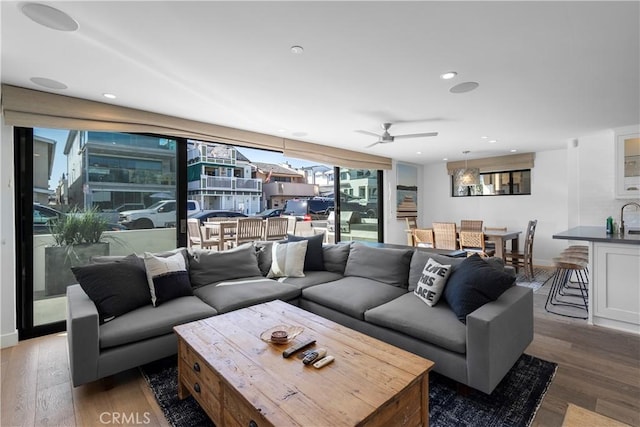112 30th St, Newport Beach, CA 92663 - living room with wood finished floors, ceiling fan, and recessed lighting