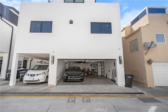 112 30th St, Newport Beach, CA 92663 - view of property featuring an attached garage