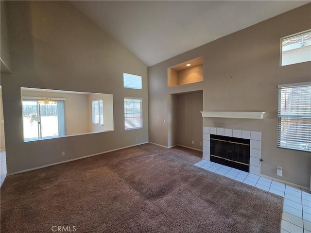 1315 Navello, El Cajon, CA 92021 - unfurnished living room with high vaulted ceiling, plenty of natural light, a chandelier, a fireplace, and carpet floors