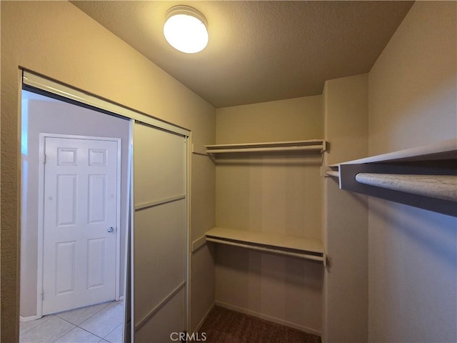 1315 Navello, El Cajon, CA 92021 - walk in closet featuring light tile patterned floors