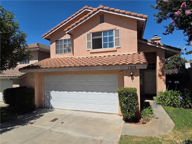 1315 Navello, El Cajon, CA 92021 - view of front facade with a garage, stucco siding, driveway, and a tile roof
