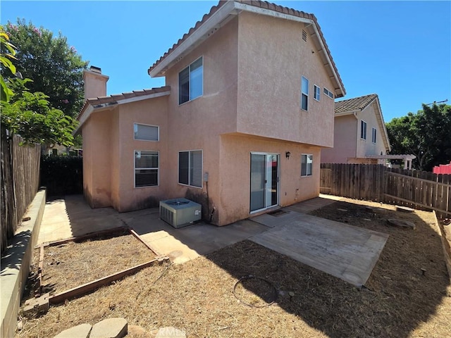 1315 Navello, El Cajon, CA 92021 - rear view of house featuring a tiled roof, stucco siding, a patio area, and a fenced backyard