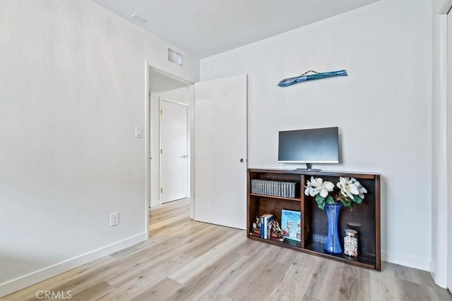 31 N 3rd St, Cayucos, CA 93430 - unfurnished living room featuring wood finished floors and baseboards