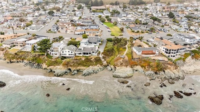 31 N 3rd St, Cayucos, CA 93430 - aerial view of property and surrounding area featuring unending shoreline and nearby suburban area
