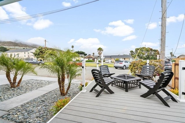 31 N 3rd St, Cayucos, CA 93430 - wooden terrace with a fire pit and a residential view