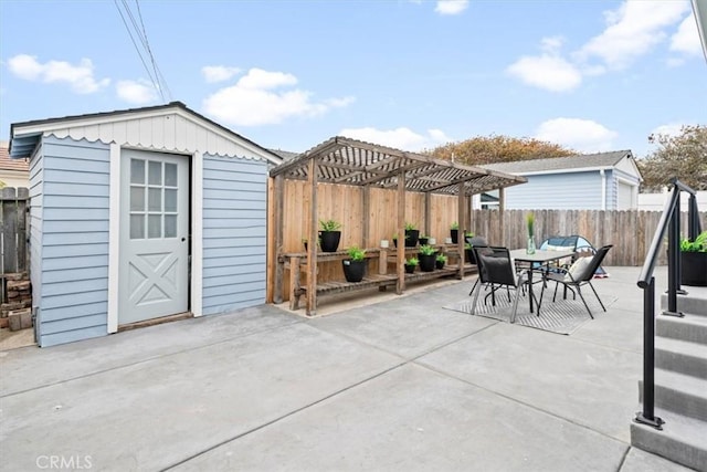 31 N 3rd St, Cayucos, CA 93430 - fenced backyard with a pergola, a patio area, an outbuilding, and outdoor dining area