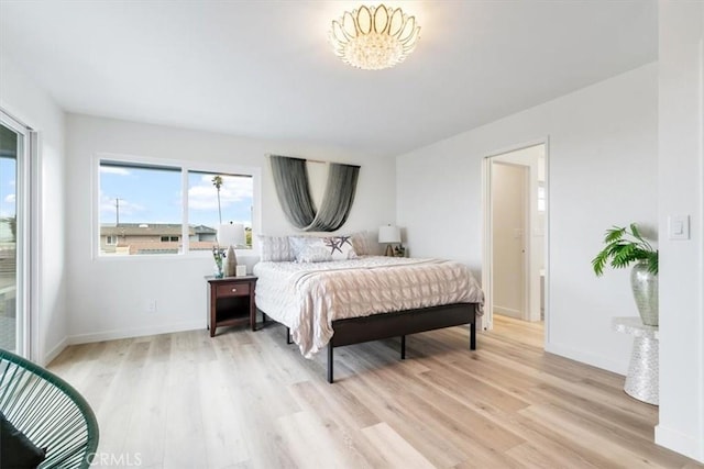 31 N 3rd St, Cayucos, CA 93430 - bedroom featuring light wood-style floors and a chandelier