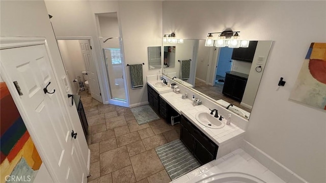 40107 Calle Breve, Temecula, CA 92592 - full bathroom featuring double vanity and a shower stall
