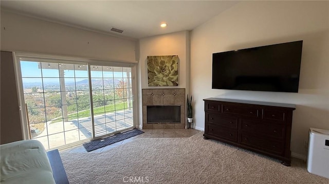 40107 Calle Breve, Temecula, CA 92592 - living area with a tile fireplace, light carpet, and recessed lighting