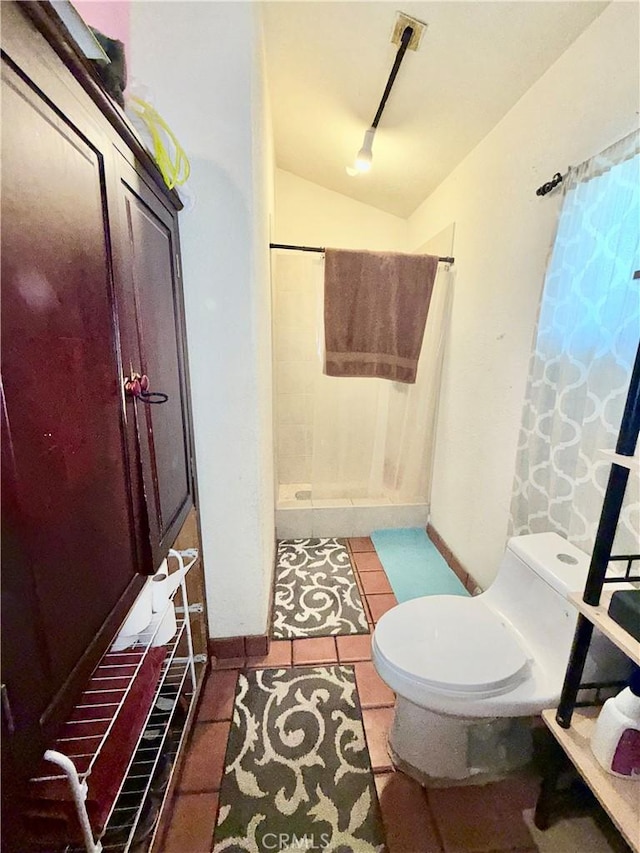 11425 Hayford St, Norwalk, CA 90650 - full bathroom with a shower with curtain, lofted ceiling, and tile patterned flooring