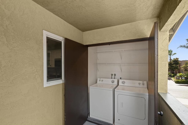 190 Avenida Descanso Unit I, Oceanside, CA 92057 - laundry area with separate washer and dryer, a textured wall, and a textured ceiling