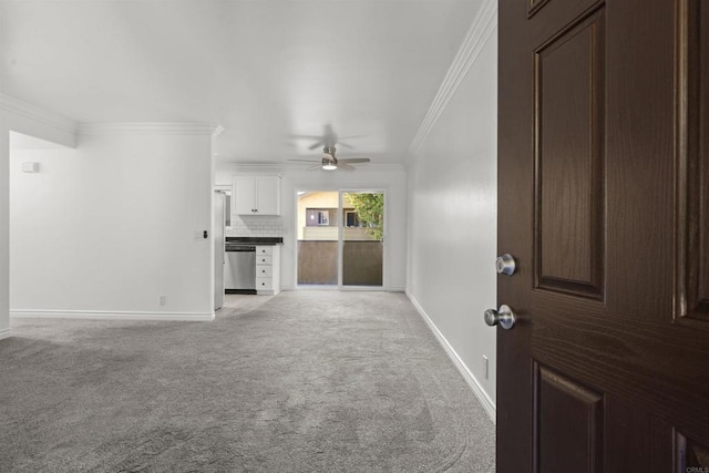 190 Avenida Descanso Unit I, Oceanside, CA 92057 - unfurnished living room with ornamental molding, a ceiling fan, and light carpet