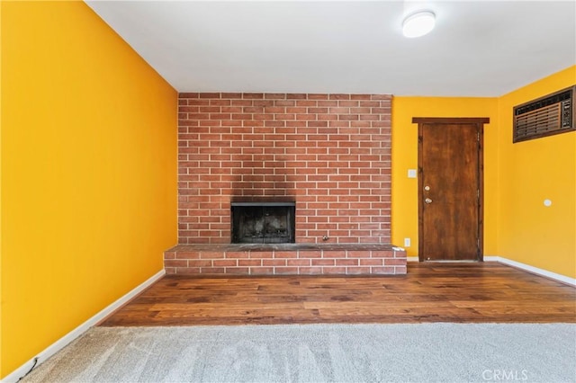 4136 Eileen St, Riverside, CA 92504 - unfurnished living room featuring a fireplace and wood finished floors
