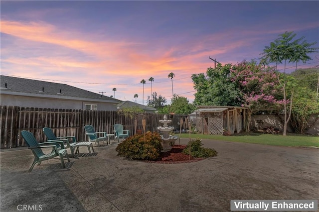 4136 Eileen St, Riverside, CA 92504 - yard at dusk with a patio area