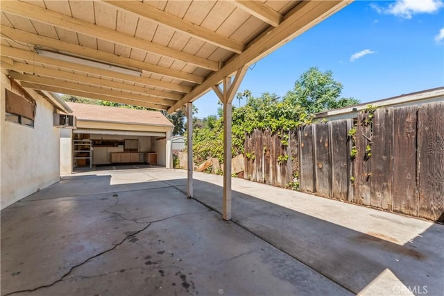 4136 Eileen St, Riverside, CA 92504 - view of patio / terrace featuring a garage and an outbuilding