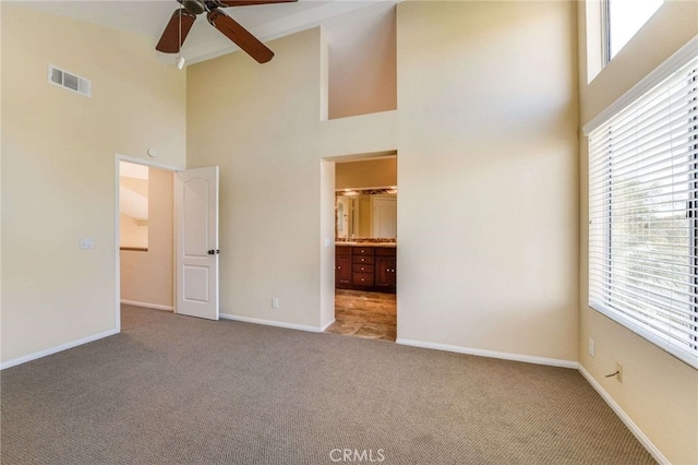 24961 Beachwalk Way, Dana Point, CA 92629 - unfurnished bedroom featuring high vaulted ceiling, carpet, multiple windows, and ensuite bath