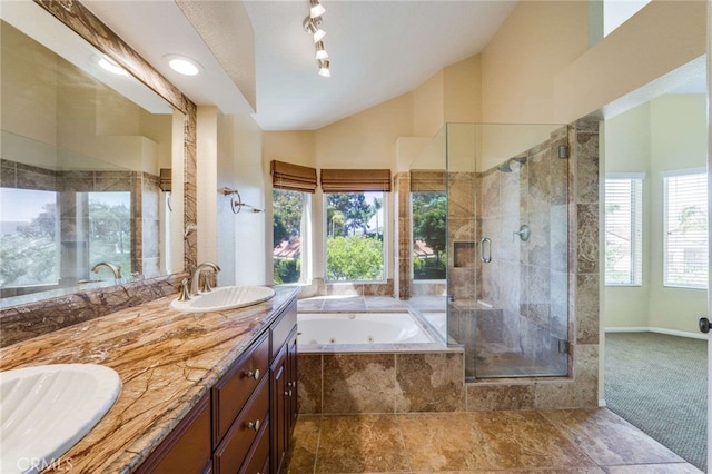 24961 Beachwalk Way, Dana Point, CA 92629 - bathroom featuring a whirlpool tub, vaulted ceiling, a stall shower, double vanity, and track lighting