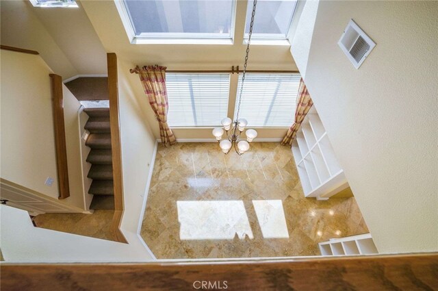 24961 Beachwalk Way, Dana Point, CA 92629 - unfurnished living room with a chandelier and stairs