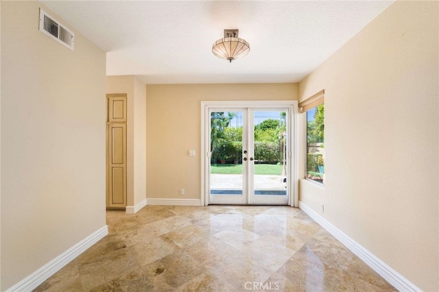 24961 Beachwalk Way, Dana Point, CA 92629 - doorway with french doors and baseboards