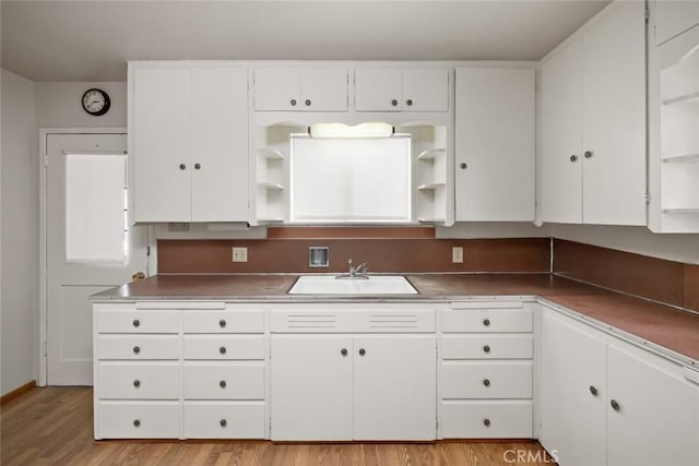 1756 6th St, Los Osos, CA 93402 - kitchen with open shelves, white cabinetry, and light wood-style flooring