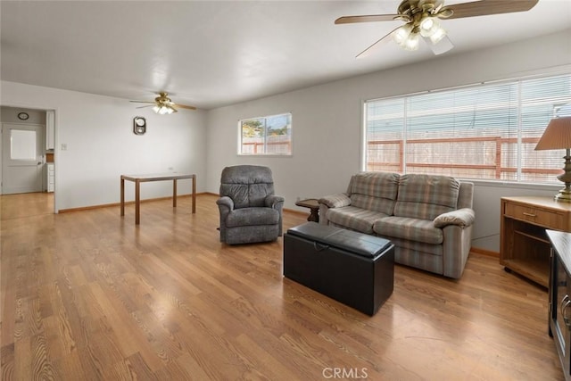 1756 6th St, Los Osos, CA 93402 - living room featuring a ceiling fan and light wood-style floors