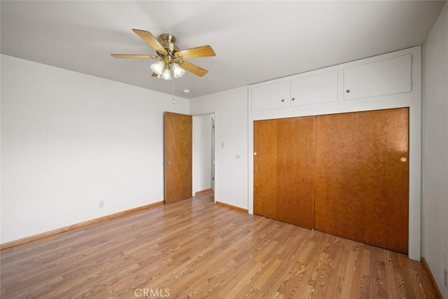 1756 6th St, Los Osos, CA 93402 - unfurnished bedroom with light wood-type flooring, a closet, and a ceiling fan