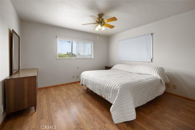 1756 6th St, Los Osos, CA 93402 - bedroom featuring wood finished floors and ceiling fan